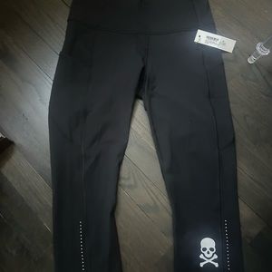 lululemon x soulcycle, Fast and Free 19” crop Nulu leggings in black.